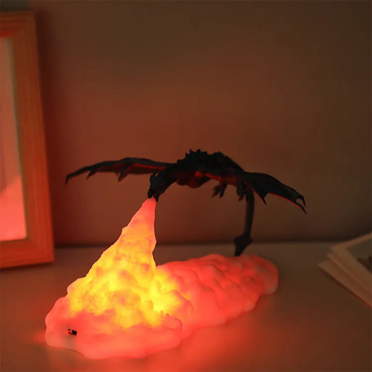 3D printed red dragon night light with fire-breathing LED glow on a dark surface