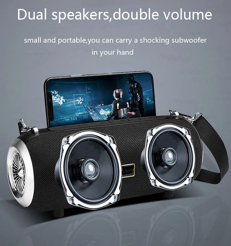 Square fabric Bluetooth speaker with shoulder strap showing mobile phone stand function and retractable FM antenna