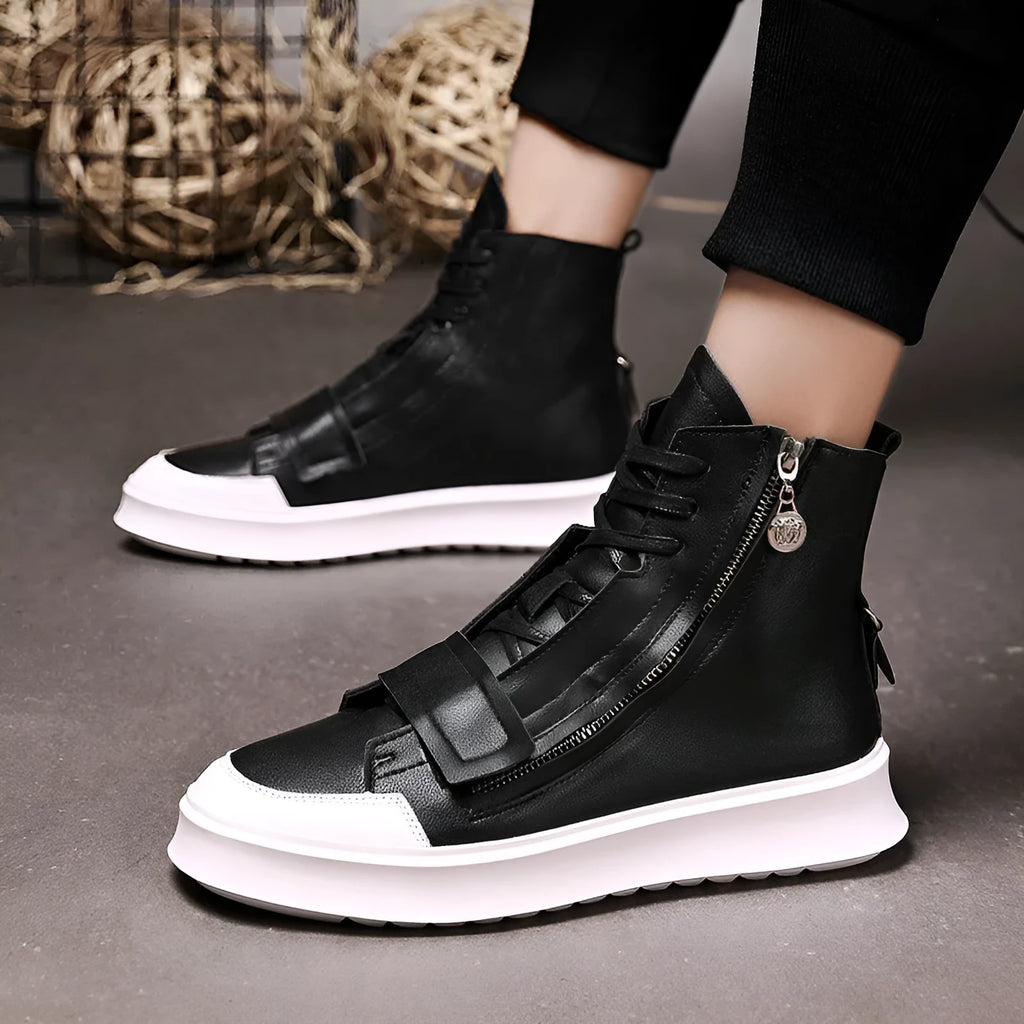Man wearing black PU leather ankle boots in a high-top sneakers style for winter.