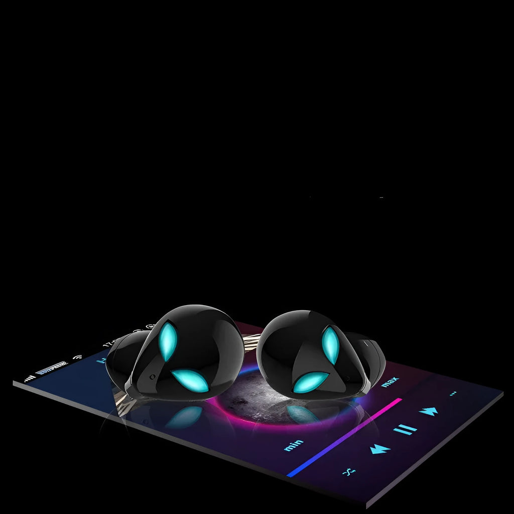 Creative Outer T8 Starman alien design wireless Bluetooth earphones in black and white with charging case.