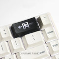 Red safety evacuation exit backspace key cap on a USB keyboard with transparent plastic construction