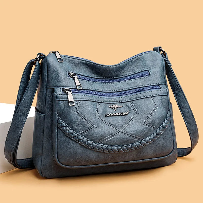 Soft leather large capacity shoulder bag in horizontal square shape with multiple compartments