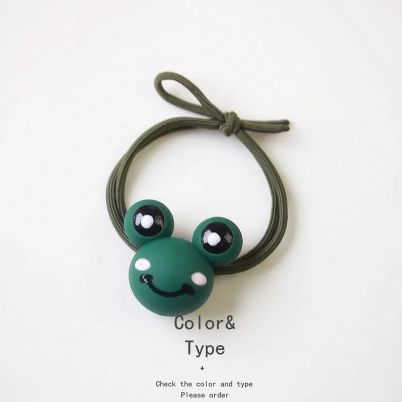 Animal cartoon hair accessories with crocodile dinosaur and frog designs in plastic resin material for women