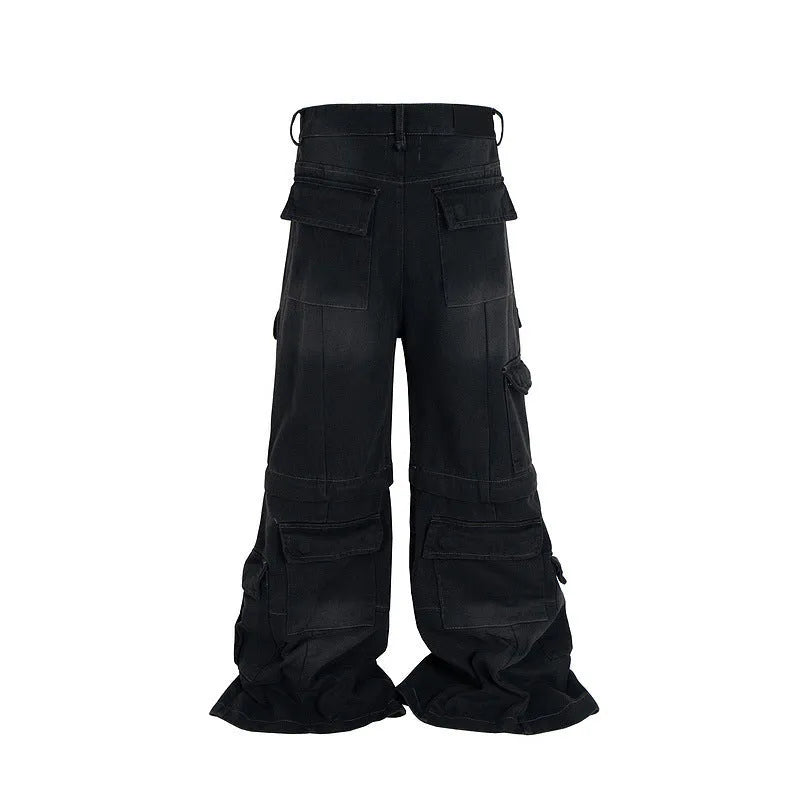 Detachable worn look cotton overalls in black, multi-pocket design with zip front, mid waist, side and front pockets visible