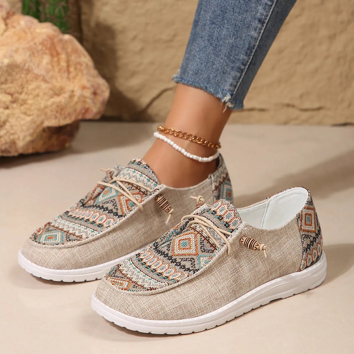 Women's black slip-on flat shoes with round toe and rubber sole