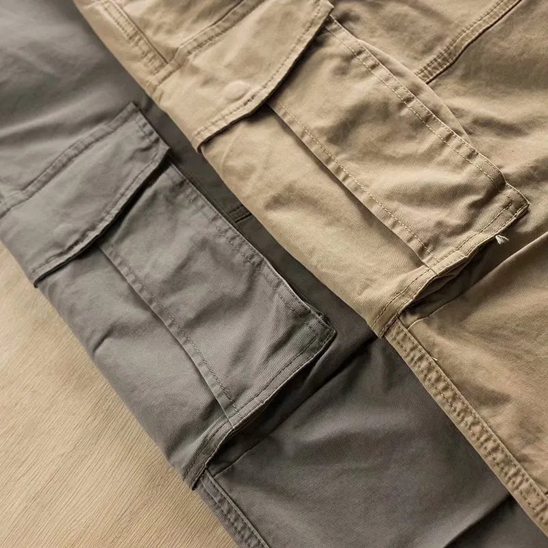 Men's cotton multi-pocket solid colour cropped work pants, available in black, blue, gray, khaki
