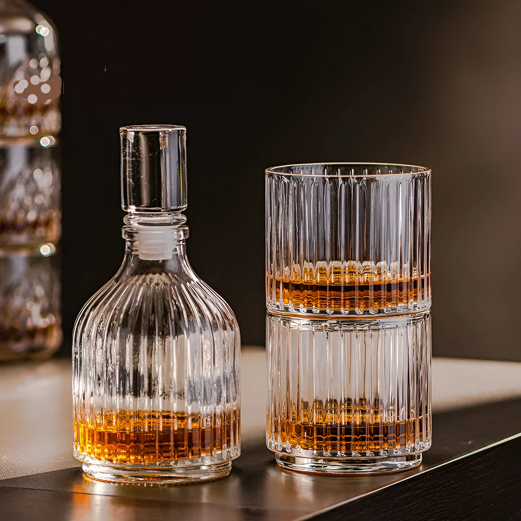 Clear glass cup and pot set with striped and diamond pattern designs for whiskey or wine
