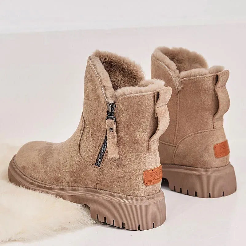 Women's black high-top snow boots with faux suede upper, side zipper, and thick plush lining.