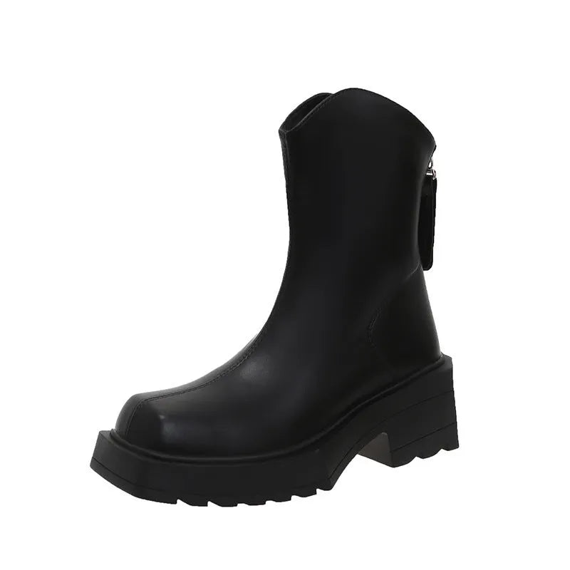 Black women's platform ankle boots with square toe, chunky sole, and rear zip fastening.