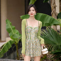 Women's floral suspender one-piece swimsuit in pink and green nylon fabric