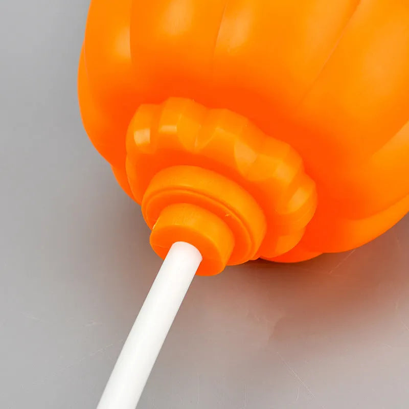 Plastic pumpkin lamp with USB cable, purple or yellow light option, 8.3cm wide by 22cm tall