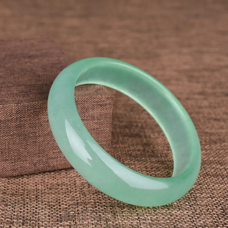 Oil cyan light green quartz rock jade bracelet with smooth polished finish, modern simplicity style