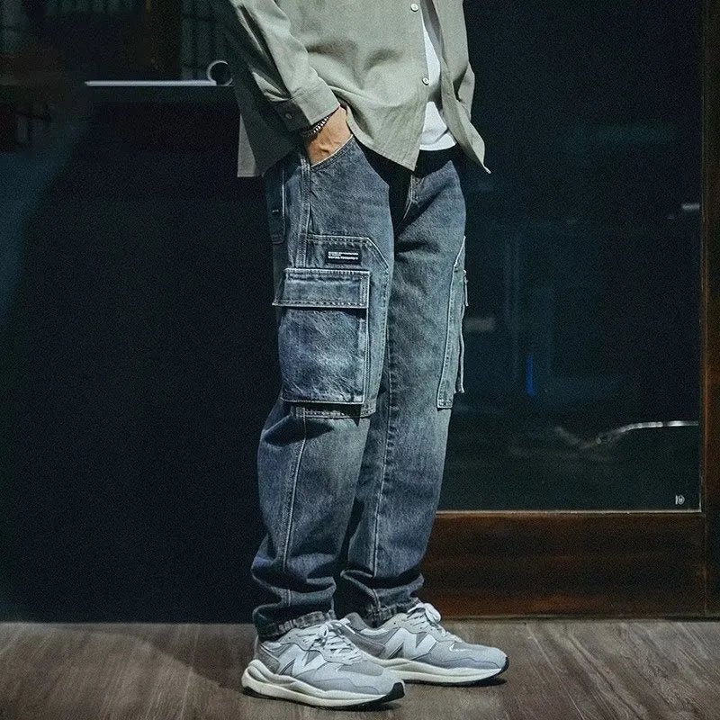 Men's blue loose straight leg jeans with retro styling and zip fly opening