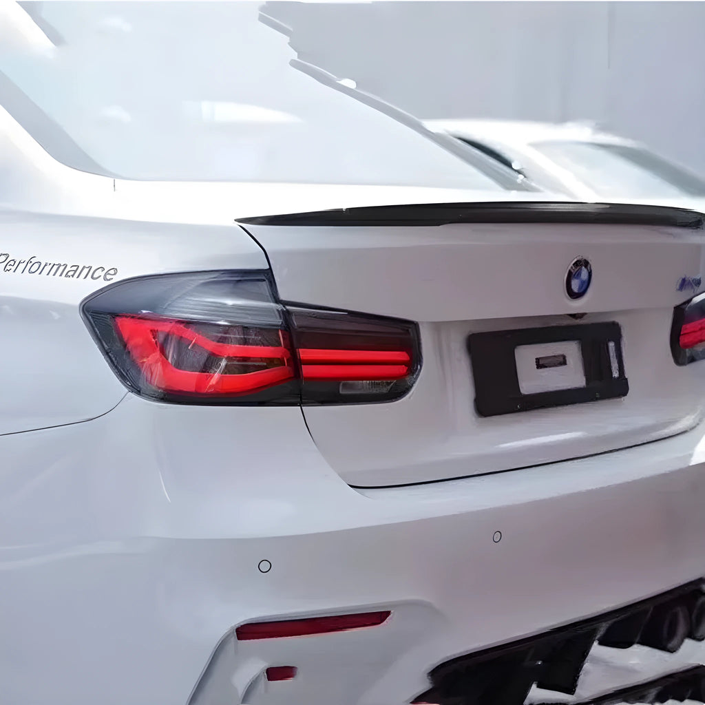 BMW 3 Series modified LED tail light assembly in red or smoked black finish for 2012-2015 models