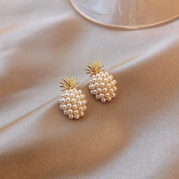 Korean style pineapple and starfish pearl earrings with electroplated alloy construction and artificial gem accents.