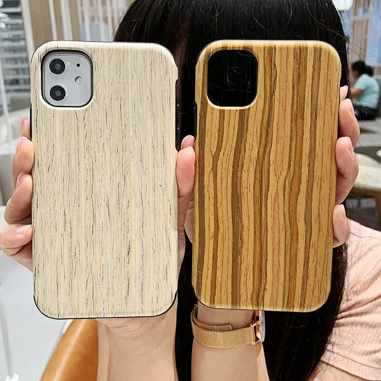 Wooden iPhone case with raised edge lip protection in natural bamboo or rosewood with visible grain patterns