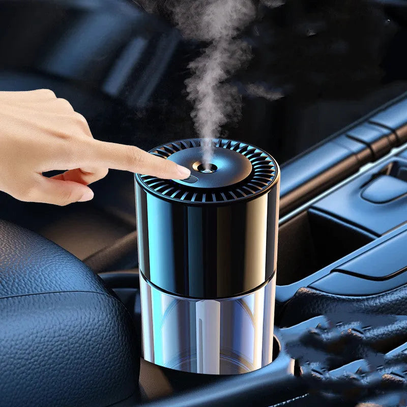 Plug-in USB spray perfume humidifier with glass base in a choice of six fragrance colours.