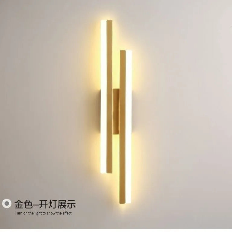 Scandinavian minimalist LED wall light with acrylic shade on black metal arm.