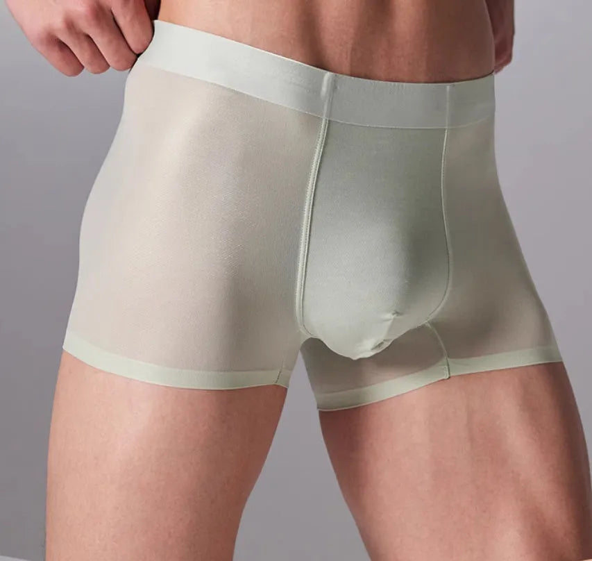 Men's lightweight seamless fitness shorts in black, shown flat, highlighting the antibacterial crotch panel and lack of seams.