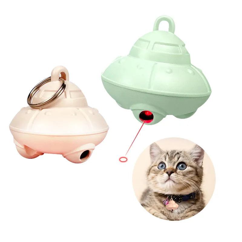 Green cat collar laser toy on a fabric background, showing 3x3x2.5cm plastic unit with 360° rotating feature