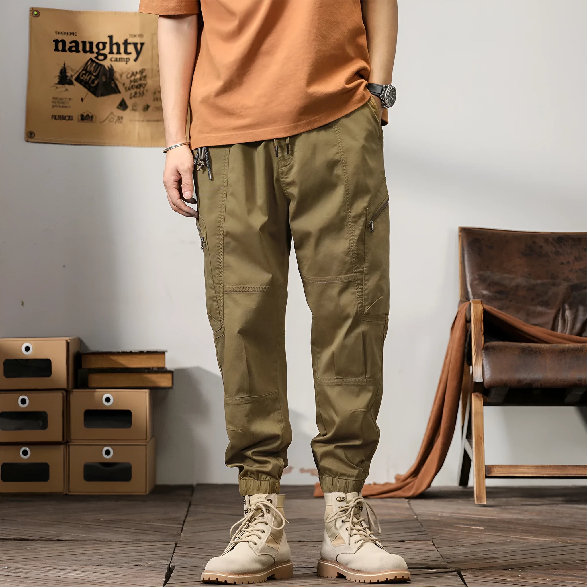 Men's tapered harem trousers in cotton fabric with elastic waist and ankle banding detail