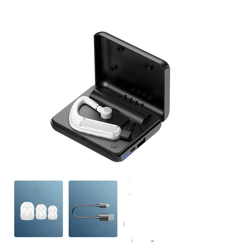 Black Bluetooth earphone with hanging ear design and silicone ear cap, shown with spare ear caps and charging cable.