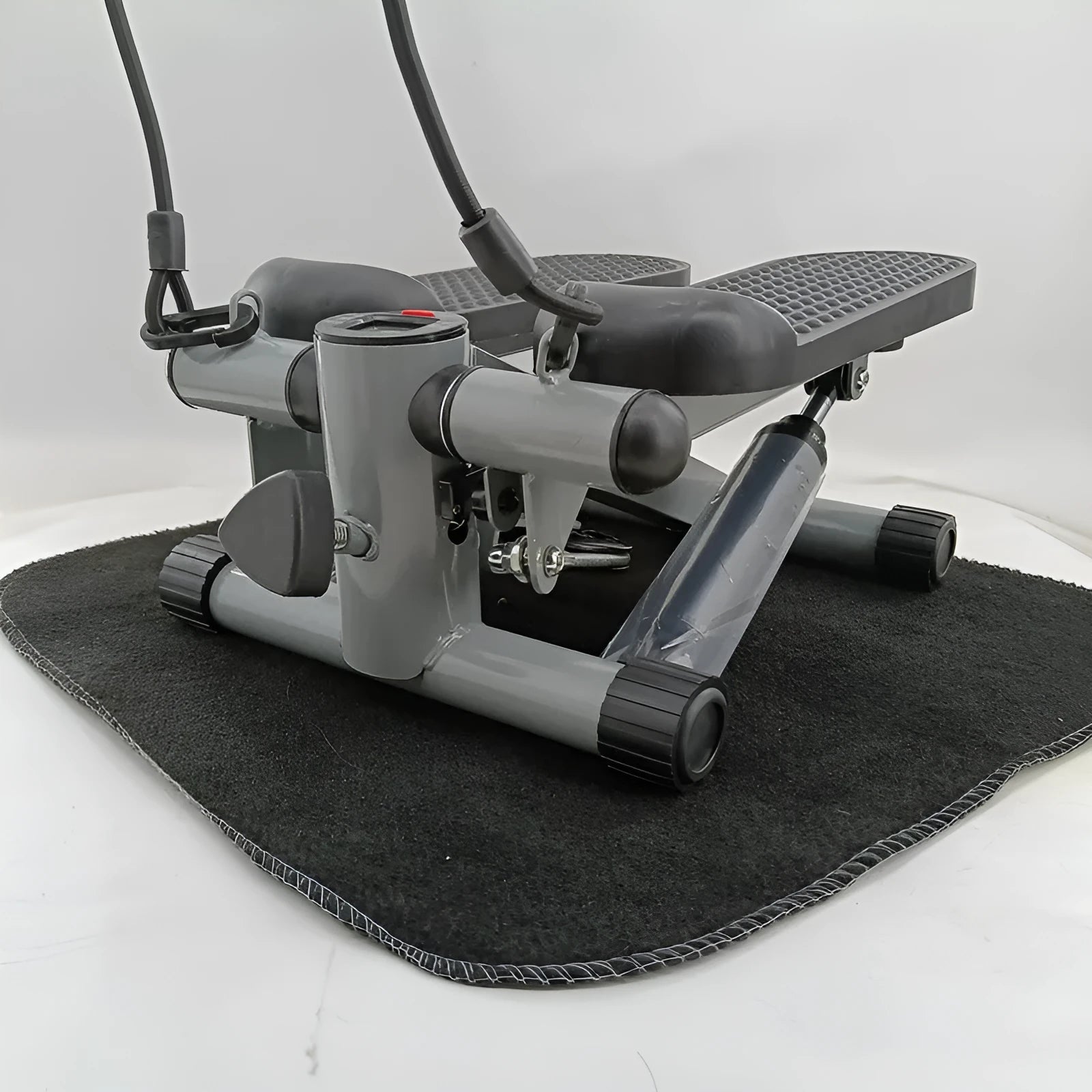 Silver grey household mini treadmill with hydraulic resistance for waist slimming exercises