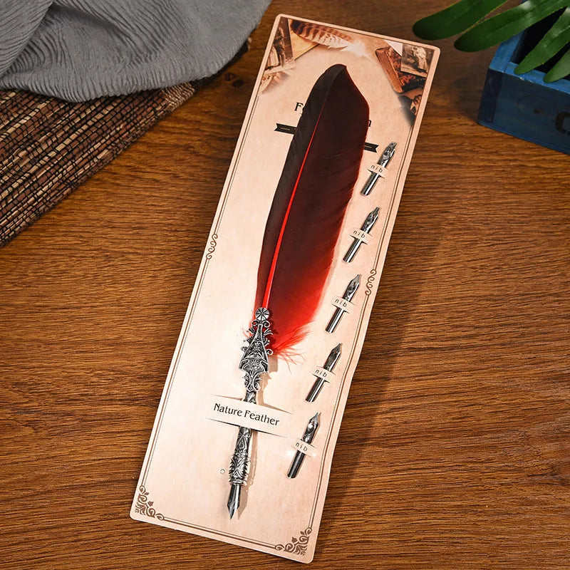 Vintage feather dip pen in ten colours with zinc alloy casing measuring 30×13×4 cm