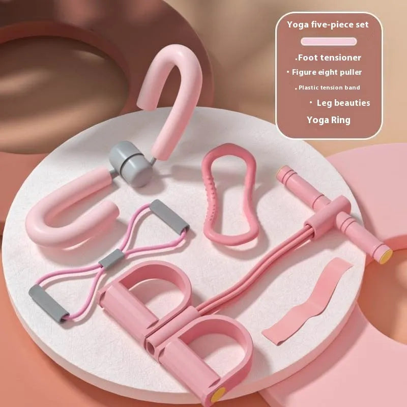 Yoga four piece set showing leg stretching device, yoga ring, pedal chest expander and figure eight tension rope