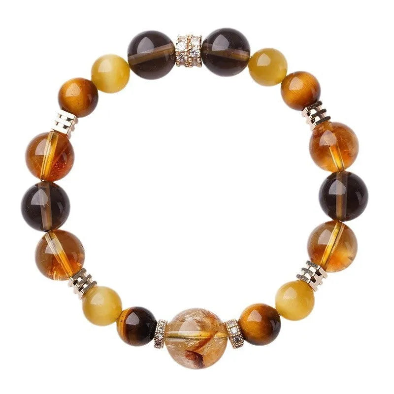 Natural tiger-eye crystal bracelet with geometric beads in either 10mm or 12mm size on a wrist.
