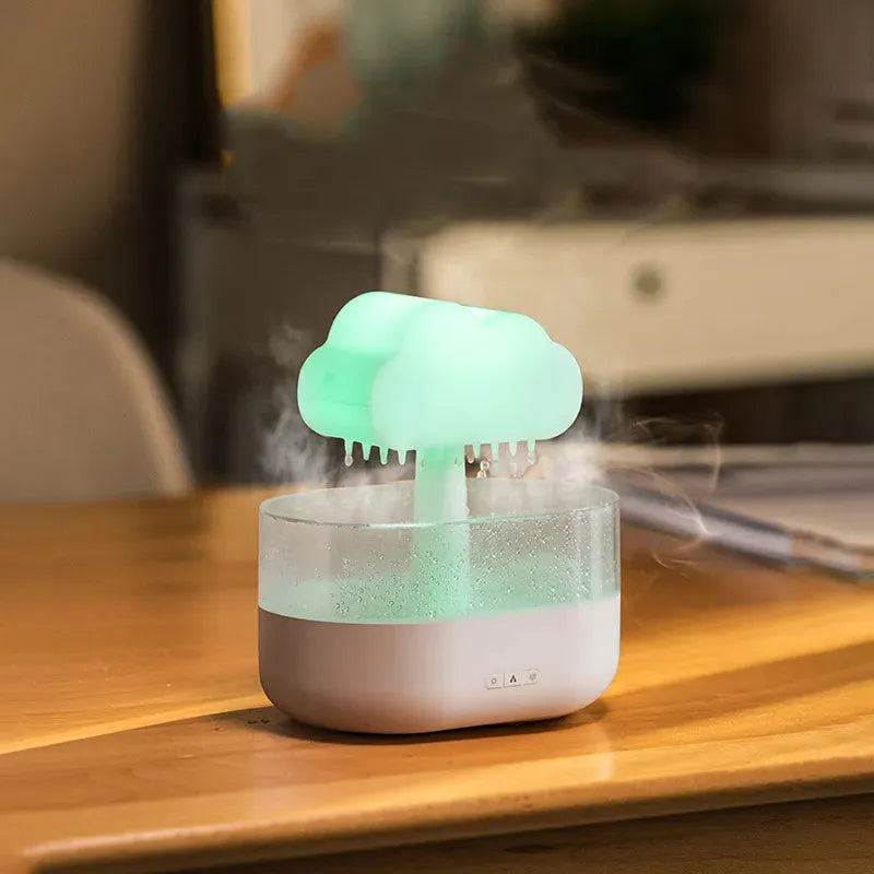 Rain cloud night light humidifier with 7 colour LED lights and raining water drop sound in white