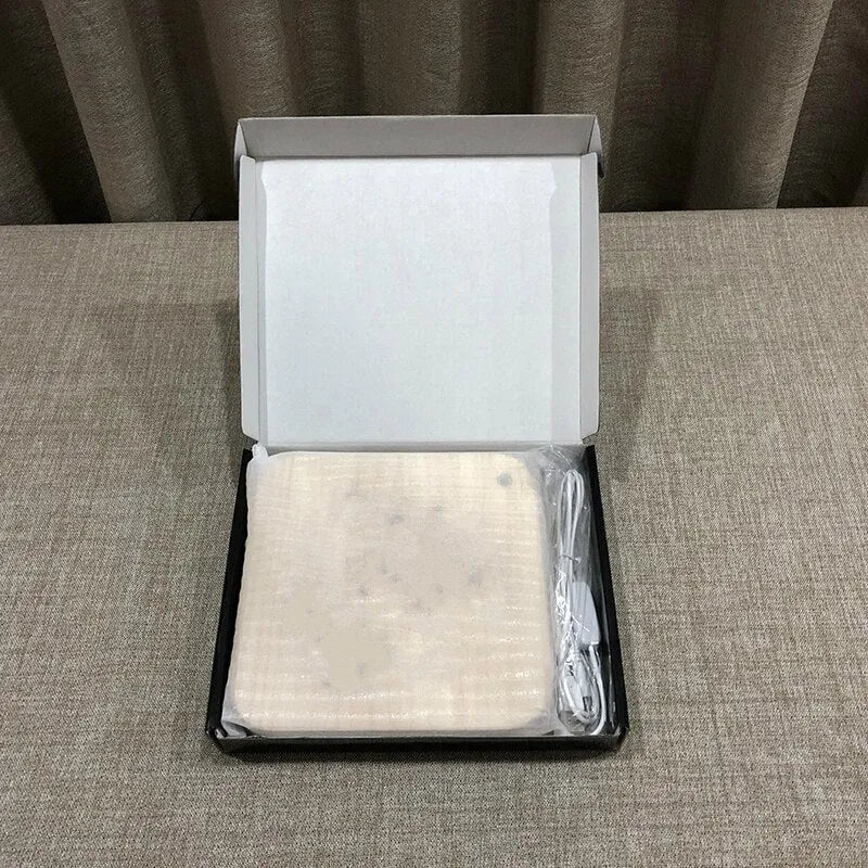 Pine wood cube LED atmosphere lamp with warm white light, showing USB cable and button switch.