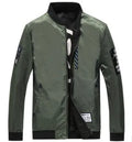 A man's reversible casual flight jacket in a striped pattern with a zip front, shown in multiple colours.