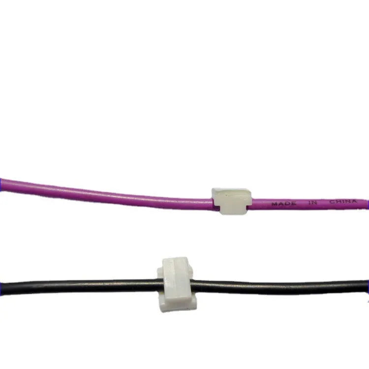 Black PA66 automotive wire clip for cable management measuring 9x12mm