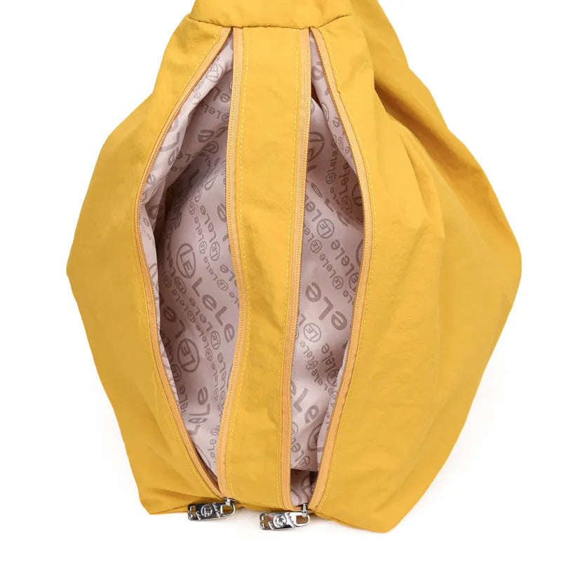Heart-shaped women's nylon underarm bag in black, yellow, khaki, or blue with shoulder strap