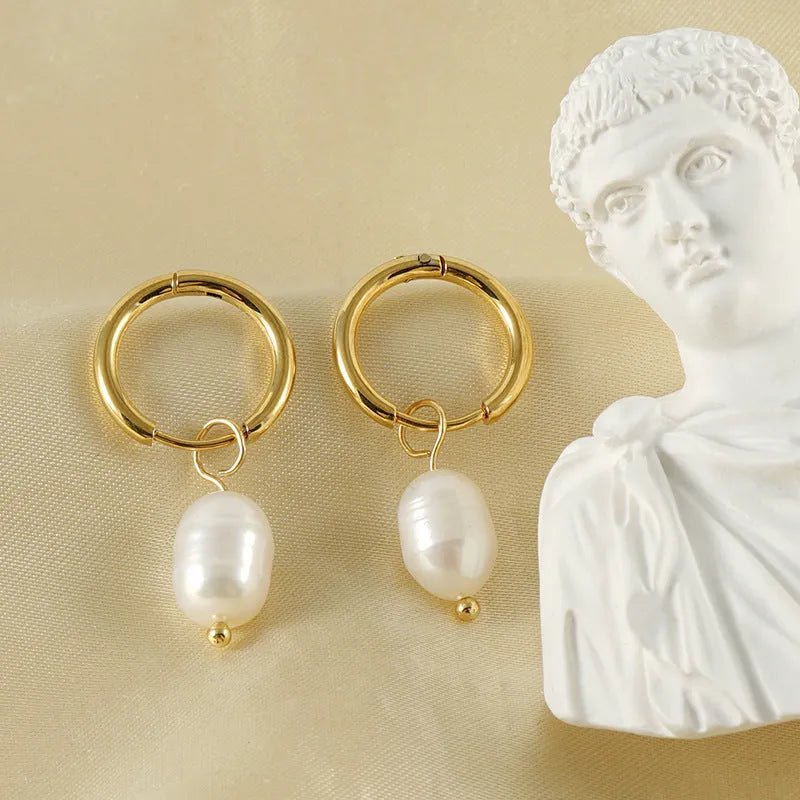 Geometric gold stainless steel earrings with pearl accents and titanium posts