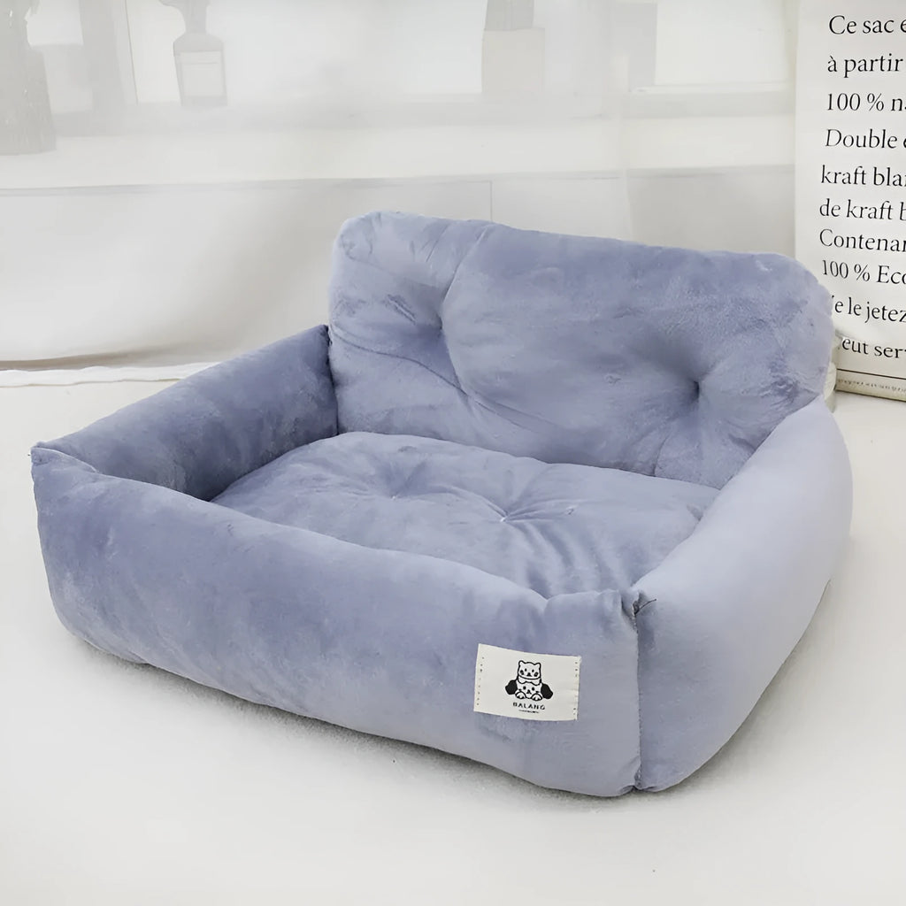 Blue plaid and grey cloth dog car seat nest shown in small and large sizes.