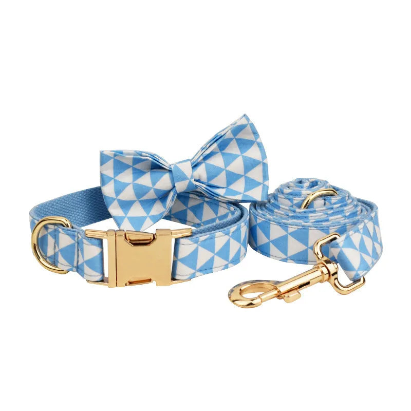 Blue triangular ring design dog vest set with matching collar, rope lead, and bow tie accessory