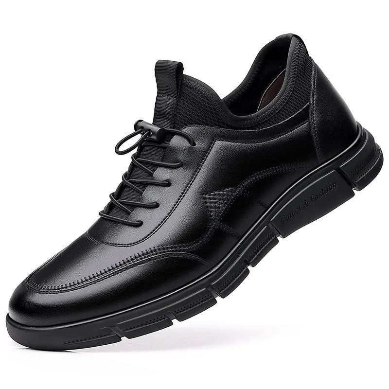 Men's black low heel casual shoes with round toe and square heel on a plain background