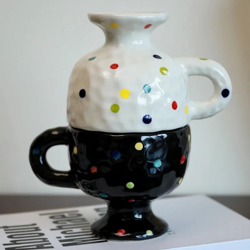 Hand-pinched irregular ceramic mug in solid colour with modern simplicity design