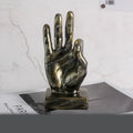 Resin gesture ornament in silver OK hand sign on desktop, blessing home decoration