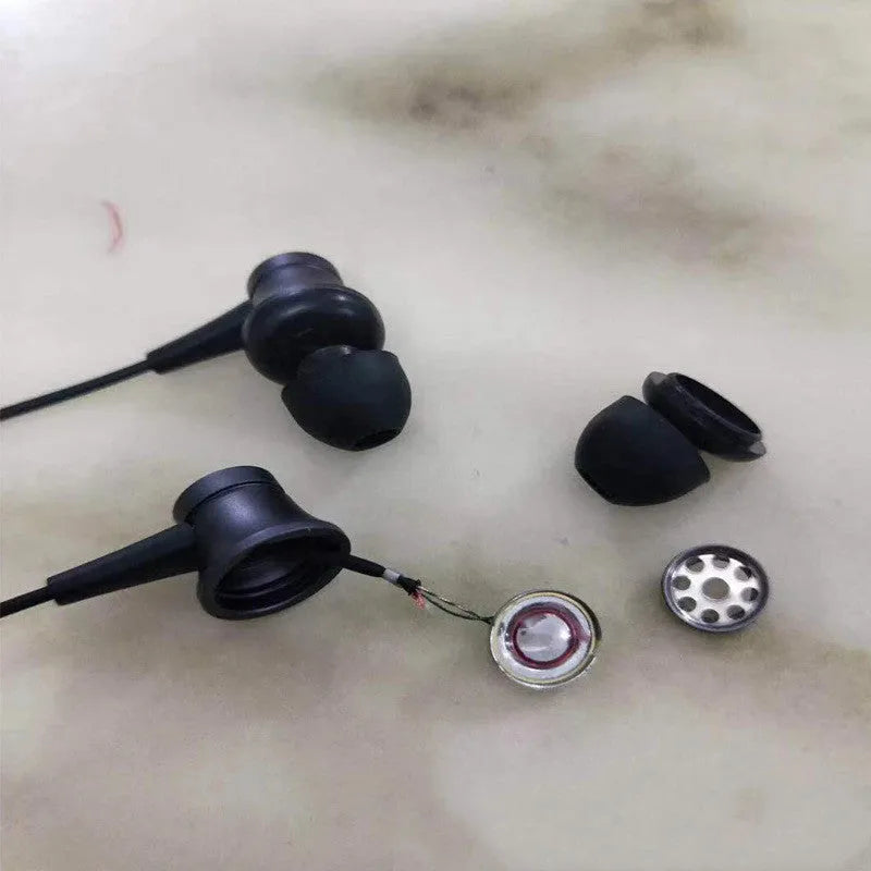 Piston style in-ear wired headphones with 3.5mm jack in black, blue and red colour options.