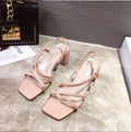 Women's thick heel sandals in apricot colour with one-strap design and backless style