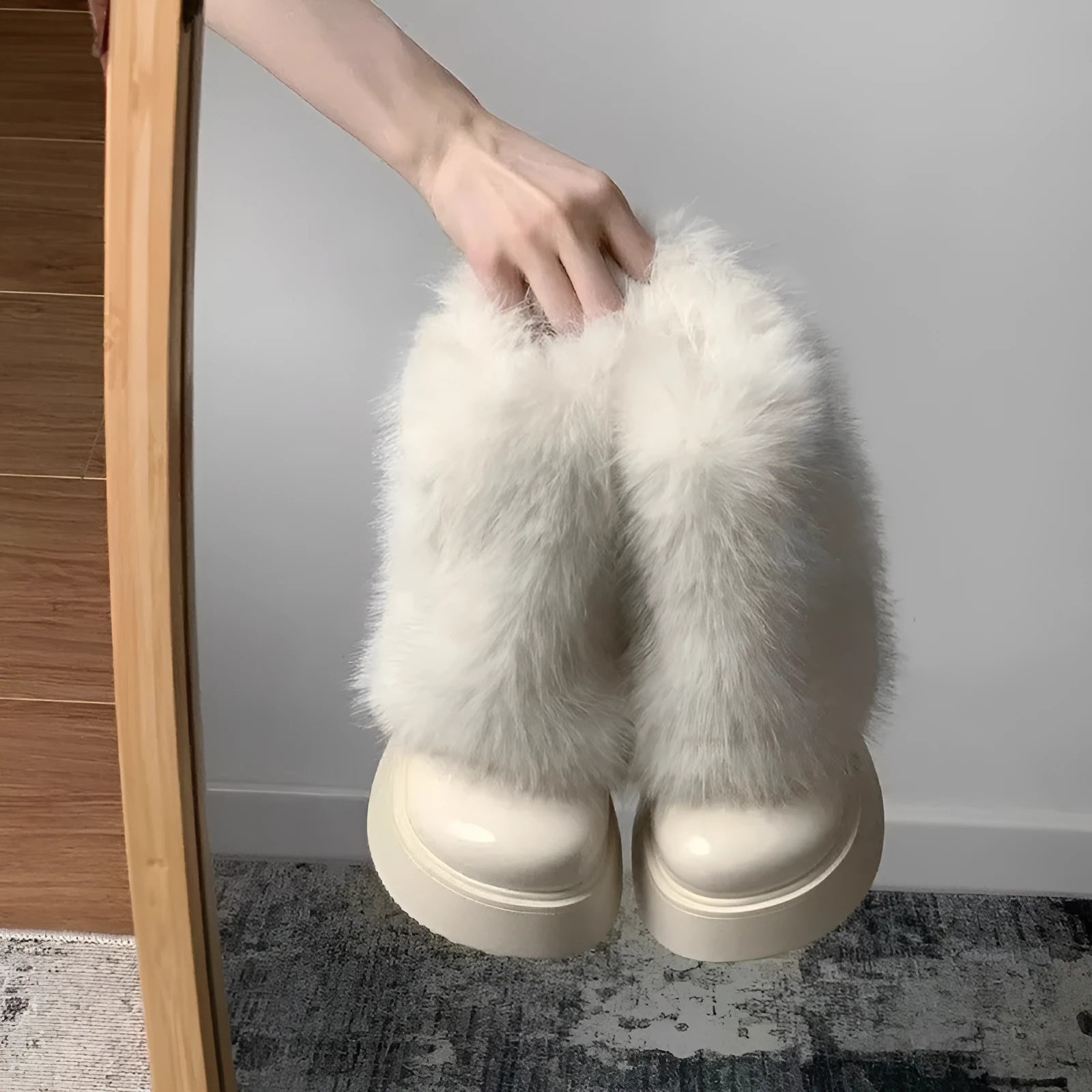 Women's low-top snow boots with artificial plush uppers, waterproof rubber soles, available in black and white colours