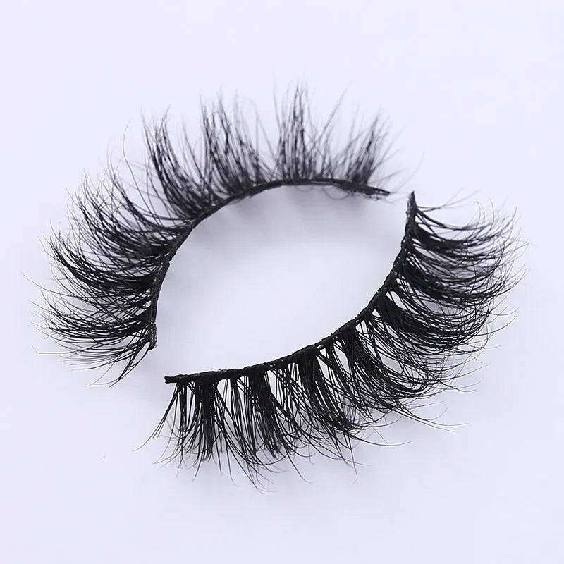 Handmade 3D mink full strip false eyelashes in style A01 against a white background