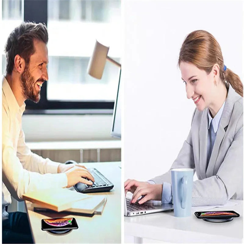 Black or white 15W Qi wireless charging pad on a table with LED light and phone charging.