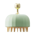 Green pet bath brush with silicone bristles and drain holes for dog and cat washing