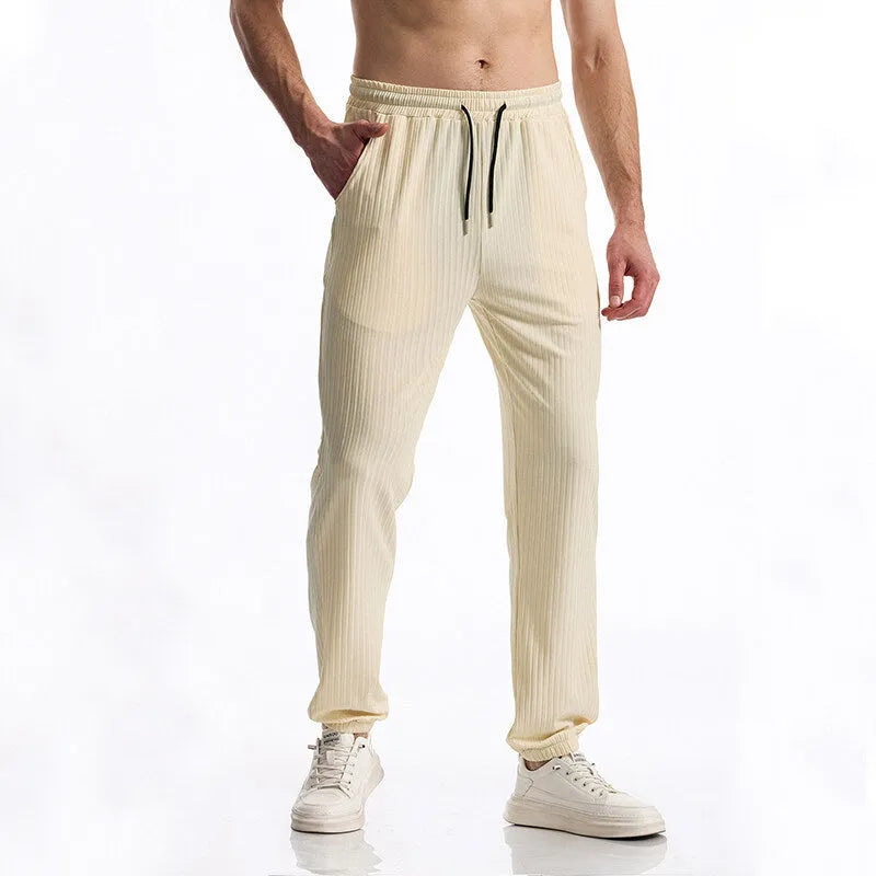 Silky rib fabric casual baggy straight trousers in black, white, and khaki with drawstring mid-waist