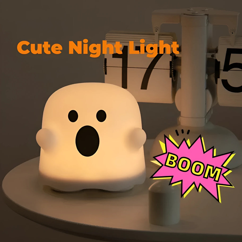 Silicone night light LED touch sensor lamp for kids bedroom in pink, showing soft glow on a bedside table