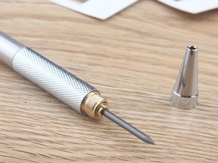 Metal automatic mechanical pencil with a choice of lead sizes including 0.5mm and 0.7mm, shown with a 2B refill.